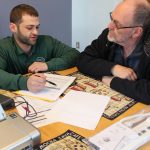 HWE reviewing a no-cost energy report with customer